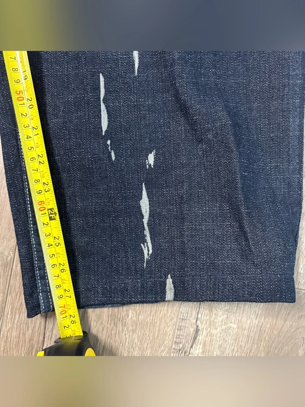 These wide-leg black jeans with white paint splatters Size 36x28